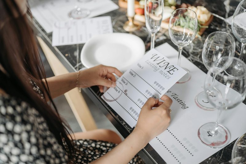 Taking tasting notes during a wine tasting session